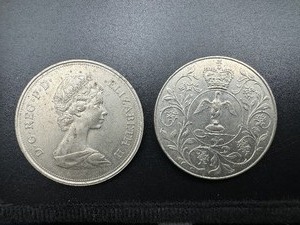 lot 84 image: 1972 Crown Coin Issued to Commemorate the Silver Wedding of Elizabeth and Philip and 1977 Jubilee Crown Coin