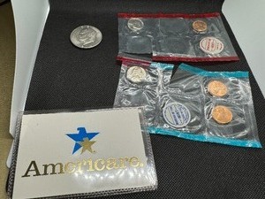 lot 88 image: Three Uncirculated Coin 1776-1976 Set 1974-D Eisenhower Dollar and Two Partial 1970 Proof Sets