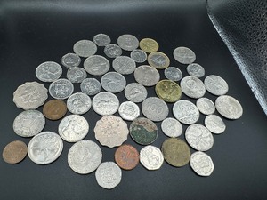 lot 96 image: Fifty Mixed Date, Mint and Country Foreign Coins