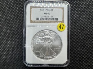 lot 47 image: 2008 American Silver Eagle NGC MS69 NGC Price Guide is $55