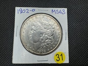 lot 31 image: 1902-O Morgan Silver Dollar Marked MS63 When Purchased