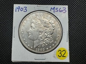 lot 32 image: 1903 Morgan Silver Dollar Marked MS63 When Purchased