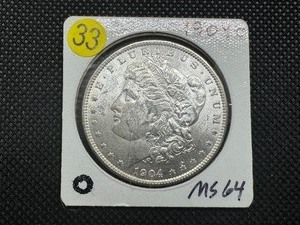 lot 33 image: 1904-O Morgan Silver Dollar Marked MS64 When Purchased