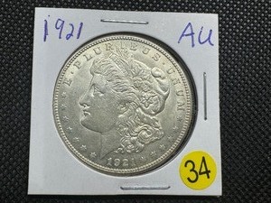 lot 34 image: 1921  Morgan Silver Dollar Marked AU When Purchased