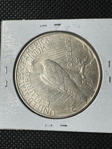 lot 38 image: 1922-D Peace Silver Dollar Marked MS64 When Purchased