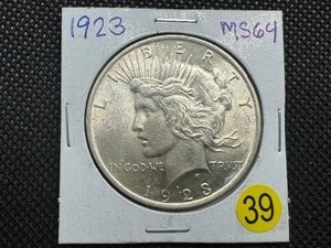 lot 39 image: 1923 Peace Silver Dollar Marked MS64 When Purchased