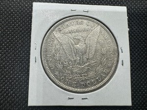 lot 8 image: 1880 Morgan Silver Dollar  Marked Choice XF When Purchased
