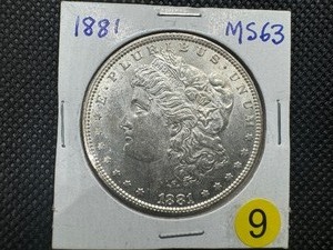 lot 9 image: 1881 Morgan Silver Dollar Marked MS63 When Purchased