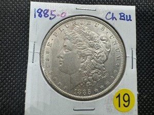 lot 19 image: 1885-O  Morgan Silver Dollar Marked Choice BU When Purchased