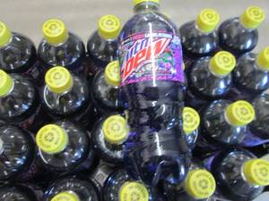 lot 306 image: 24 - 20 oz Mountain Dew Purple Thun...