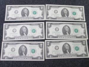 lot 428 image: 6 Sequential, Uncirculated $2 Bills...
