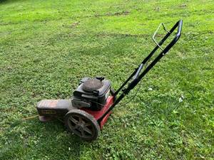 lot 55 image: Swisher Model ST650ccQ 6.5HP Trim-N-Mow