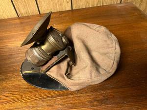 lot 172 image: Antique Minors Soft Cap with Auto Lite Lamp