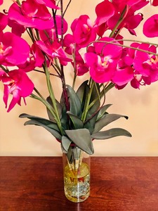 lot 105 image: Brighten up the Day with Faux Hot Pink Flowers and Glass Vase with Marbles