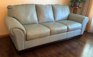 lot 15A image: Ashley Furniture Leather Sofa  Couch