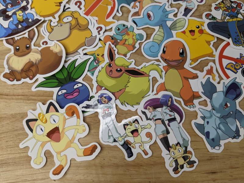lot 48B image: 50 Brand New Pokemon Stickers Pikachu Psyduck Eevee Squirtle Charmander N