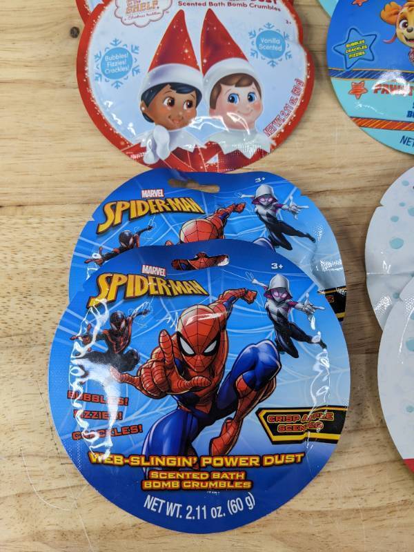 lot 48A image: (12) Brand New Scented Bath Bomb Crumbles Spiderman, Elf on a Shelf, Paw Patrol, Cocomelon, That Girl, LOL Surprise N