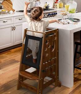 lot 52 image: New TOETOL Bamboo Kids Kitchen Height Adjustable Step Stool & Toddler Standing Tower with Keeper and Activity Board in Walnut $149.99 Retail B