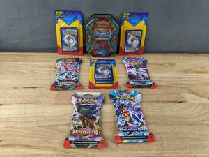 lot 34D image: Brand New Pokemon (3) Trading Cards,  (1) TCG Salamence Tin, (2) Paradox Rift, (1) Paldea Evolved, (1) Twilight Masquerade I