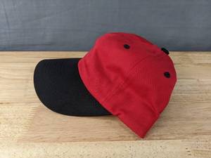 lot 85A image: 10 Brand New Advantage Series LTD. Red and Black Hats OSFM  A