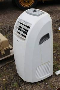 10000 BTU Portable Air Condition & Dehumidifier LG Model # LP 1015 WNR, With Window Kit