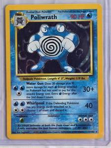 lot 15 image: Poliwrath 1999 Pokmon Holo #13102 Rare Holofoil Card