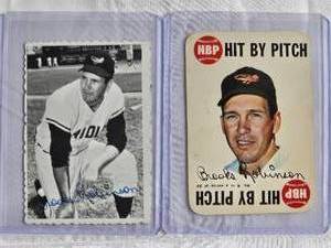 lot 38 image: Lot of 2 Brooks Robinson 1969 Topps #1 of 33 & 1968 Topps Game #9 of 33 Hit by Pitch