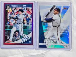 lot 82 image: Lot of 2 Freddie Freeman Refractors 2017 Topps Finest #85 & 2018 Panini Donruss Optic #68
