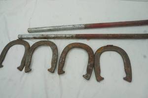 lot 215 image: Double Ringer horseshoes with stakes