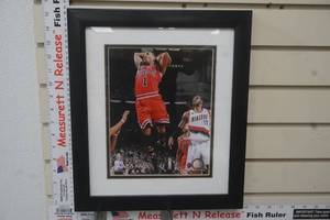 lot 35 image: Derrick Rose poster