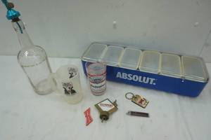 lot 132 image: Budweiser glass, Absolut, liquor lot