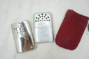 lot 144 image: 2 hand warmers