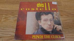 lot 197 image: Elvis Costello and the Attractions-Punch The Clock-1983-Vinyl LP