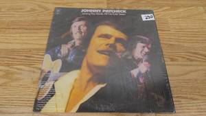 lot 250 image: Johnny Paycheck-Loving You Beats All Ive Ever Seen-1975-Vinyl LP