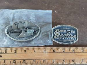 lot 42 image: 1982 Allis Chalmers & 1986 Back To 60s Collector Belt Buckles