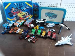 lot 49 image: Lot Of Little Cars, Trucks, Ertl Rocket, Carry Case & Lap Desk