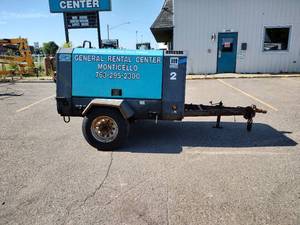 lot 3 image: Airman Portable Diesel Trailer Air Compressor, Started right up. Model PDS185S includes 1 hose