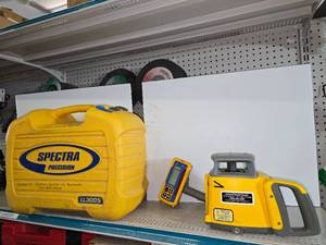 lot 88 image: Spectra Precision Transit self-leveling Laser Package  LL300S with HL760 Receiver