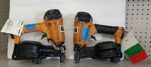 lot 214 image: (2) Bostitch magnesium nail gun (one misfires and one leaks air)