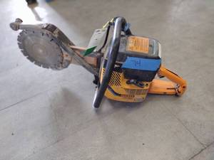 lot 74 image: Partner Wet Saw with front duel blade extension. Started and it ran