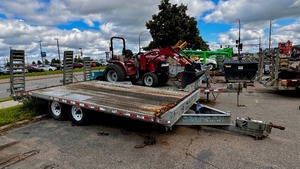 lot 44 image: 2002 8x18 Car Hauler Trailer. 2 channel equipment ramps. Chains. Wood deck.