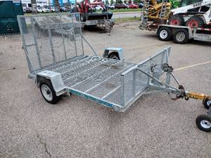 lot 27A image: 1995 6x8 Galvanized Flatbed Trailer with drop-down mesh ramp. Single axle. Trailer measures 63 x 84 x 5H at the gateramp