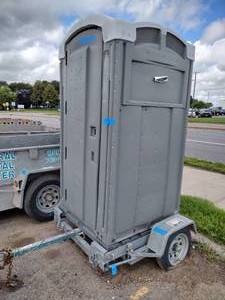 lot 201 image: Port-a-potty with Toilet trailer (gray)
