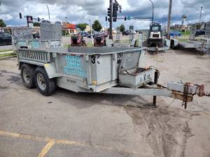 lot 43 image: 2017 Redi-Haul 6x12 Landscape Dump Trailer, Powers Up. RH1226DTS. 21high sides, rear swinging doors, fender mounted ramp. Chains included