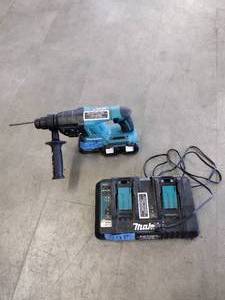 lot 241 image: Makita XRH05 Cordless 1-inch Rotary Hammer Drill with 2 chargeable batteries and charging station