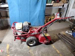 lot 93 image: Barreto 1320 Heavy Duty Full-size Rear-tine TillerCultivator. Weighs approx 560 LBS. Honda Engine