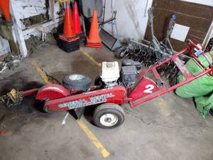 lot 60A image: Toro stump grinder with tow bar