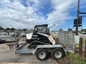 lot 38 image: 2016 Redi-Haul 6 x 12 Tandum Trailer with Combo split gate mesh drop-down ramps. Chains. 4 tie down rings. Model FSL12LD.