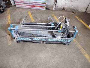 lot 61B image: Tile Rail Saw, corded engine starts up