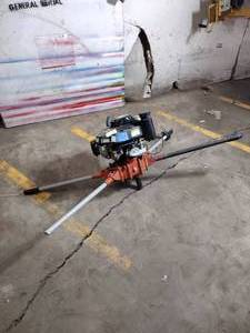 lot 72A image: General Equipment 2-man hole digger with Magura twist grip, powered by Honda GXV 160